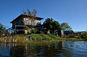 Inle Lake Myanmar. All the buildings are constructed on piles. Residents travel around by canoe, but there are also bamboo walkways and bridges over the canals, monasteries and stupas. 